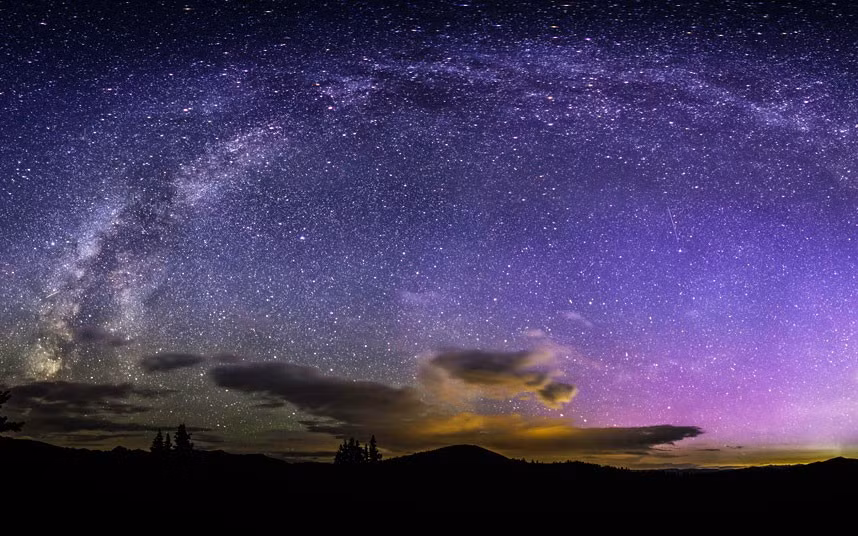 The Milky Way arcs over Aspen, Colorado, in this composite picture by Thomas O’Brien. He stitched together 24 shots - the shutter was open for about 25 seconds each exposure.
