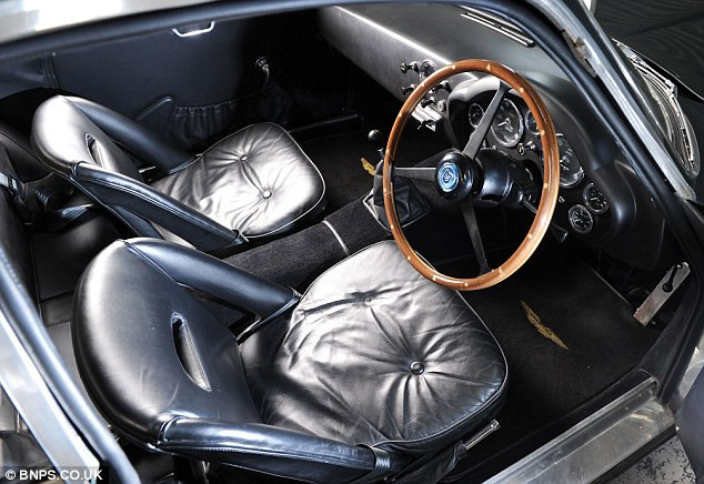 Leather interior: The Sanction II cars include an engine built to 4.2-litre specification and a 35-gallon fuel tank Read more: http://www.dailymail.co.uk/news/article-2151109/Aston-Martin-goes-1-23m-collection-46-British-classic-cars-hammer-record-breaking-sale.html#ixzz1wDp6pD5X