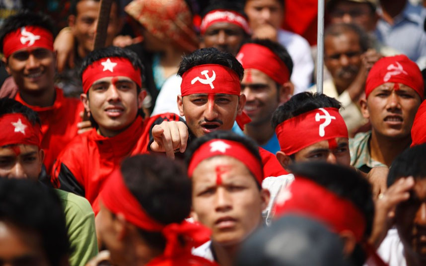 Ngày Quốc tế lao động trên khắp thế giới ảnh 6 Maoist activists and supporters arrive during a rally to commemorate Labour Day in Kathmandu, Nepal