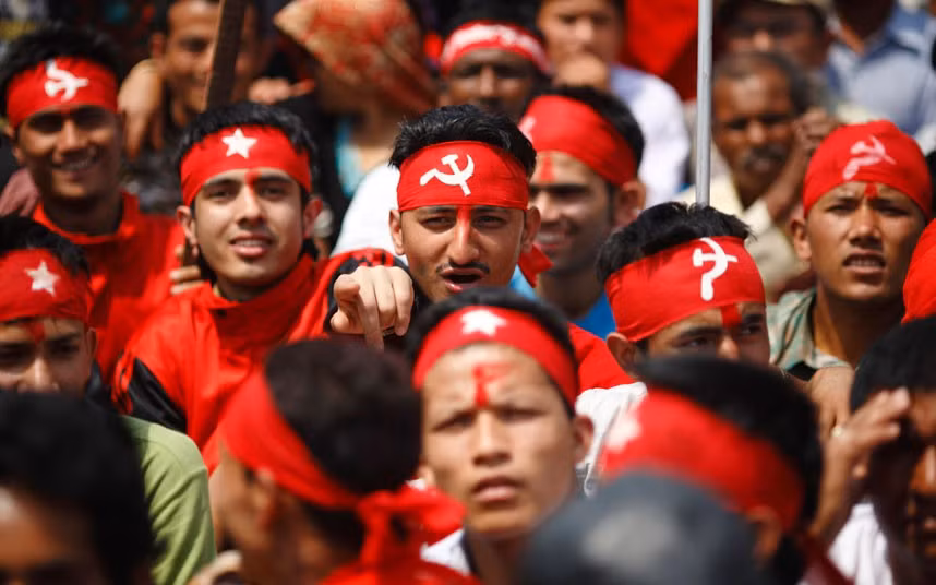 Maoist activists and supporters arrive during a rally to commemorate Labour Day in Kathmandu, Nepal