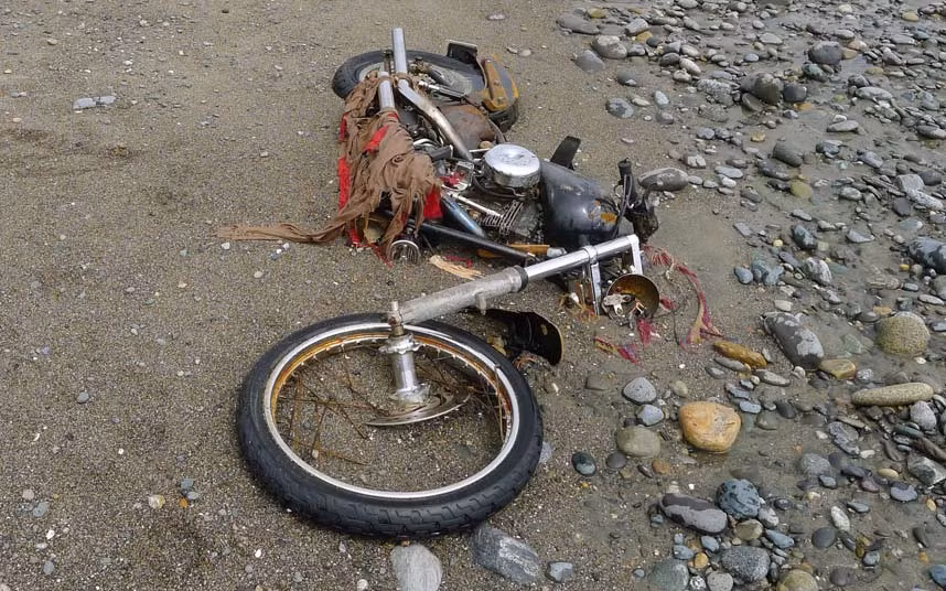 A Harley-Davidson motorbike lies on a beach in Graham Island, western Canada. Japanese media say the motorcycle lost in last year’s tsunami washed up on the island about 6,400 kilometers (4,000 miles) away