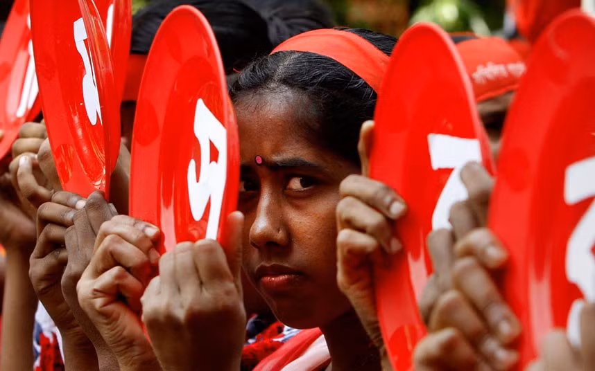 Bangladeshi garment workers participate in a rally to mark May Day in Dhaka