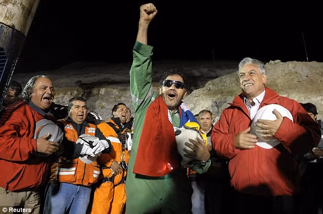 Last man standing: Foreman Luis Urzua, who is credited with rationing food and helping the miners to stay positive, was the final miner to emerge Read more: http://www.dailymail.co.uk/news/article-1320045/CHILEAN-MINERS-RESCUE-Back-dead-69-days-trapped-underground.html#ixzz127YsrGw2