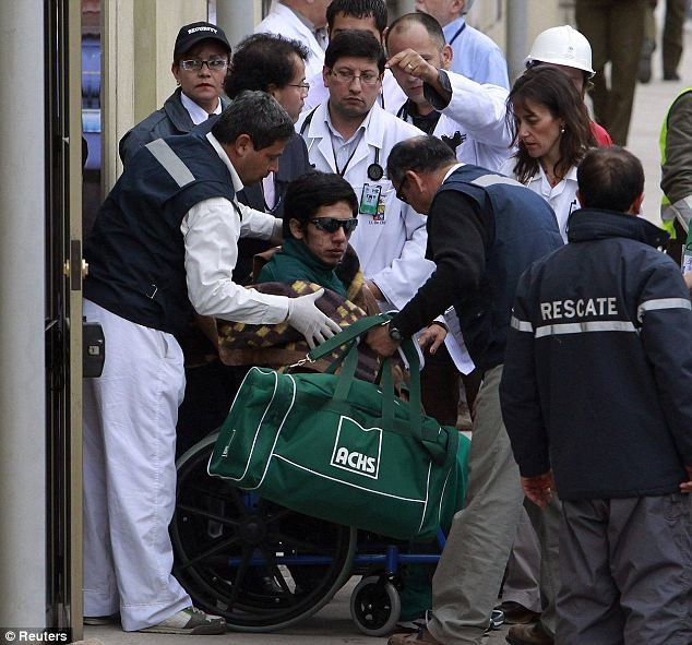 Jimmy Sanchez arrives at the Copiapo hospital for a full check-up after being rescued from the San Jose mine Read more: http://www.dailymail.co.uk/news/article-1320045/CHILEAN-MINERS-RESCUE-Back-dead-69-days-trapped-underground.html#ixzz12Hv7C7Lv
