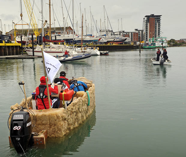 BBC presenters attempt to sail a five and a half ton boat made of ice. The project for science show Bang Goes The Theory was meant to test an extraordinary concept, put forward during World War II, that ships could be made from frozen water. In the event of steel stocks running out in the 1940s, inventor Geoffrey Pyke suggested it was possible to make an unsinkable aircraft carrier using a material called Pykrete, made of both ice and wood pulp. The mixture could be moulded into any shape and, with a slow melting rate, it was thought perfect for seafaring vessels. The BBC decided to put Pyke’s theory to the test by mixing 5,000 litres of water with the hefty material hemp and freezing it in a 20 feet-long boat-shaped mould. It took three weeks to freeze it in one of the UK’s largest ice warehouses, in Tilbury, Essex, before it was ready for launch in Gosport, Hants. The plan was to sail the boat, complete with outboard, to Cowes in the Isle of Wight with the show’s presenters, Jem Stansfield, Liz Bonnin, Dallas Campbell and Dr Yan Wong, on board...
