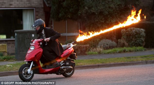 Colin Furze also converted a sports scooter so that it fires flames from its exhaust Read more: http://www.dailymail.co.uk/sciencetech/article-1320101/The-worlds-fastest-mobility-scooter-Plumber-converts-vehicle-hit-69mph.html#ixzz127IiMnaI