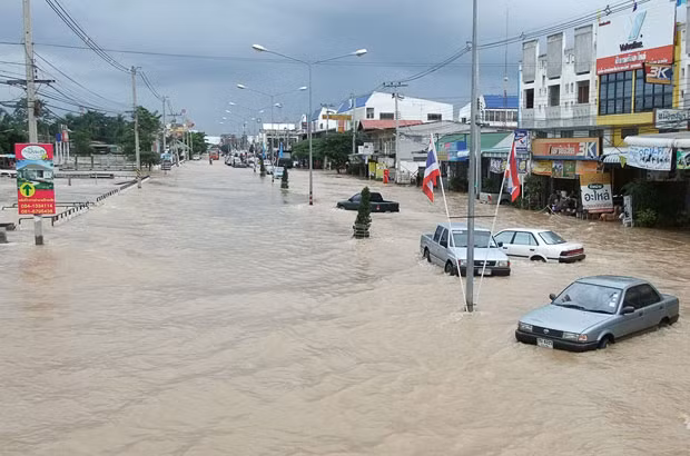 Thailand also reported flooding that submerged thousands of homes and vehicles and halted train services. No casualties were reported, and nearly 100 elephants were evacuated from a popular tourist attraction north of the capital Cars are seen on a flooded street in north-eastern province of Nakhon Ratchasima, Thailand 