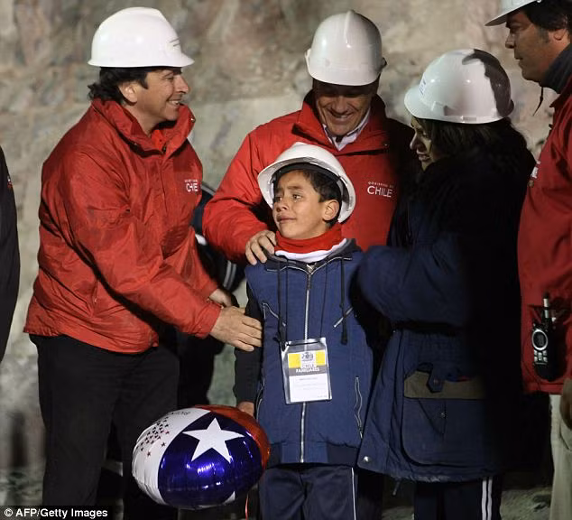 Jimmy Sanchez arrives at the Copiapo hospital for a full check-up after being rescued from the San Jose mine Read more: http://www.dailymail.co.uk/news/article-1320045/CHILEAN-MINERS-RESCUE-Back-dead-69-days-trapped-underground.html#ixzz12Hv7C7Lv