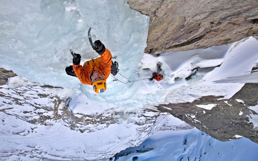 These daring climbers kept their cool as they scaled a frozen waterfall a staggering 7,200 feet up in the Alps. Leading British explorer Kenton Cool, in orange, on Nuit Blanche, Chamonix.