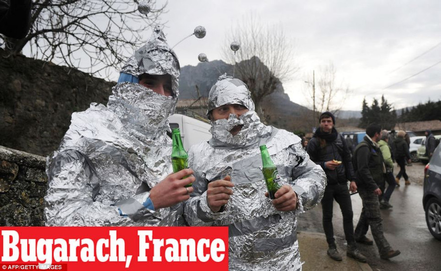 Good time: Men disguised in ’martian’ outfits drink beers on the streets of France. Doomsday followers were convinced there will be no December 22nd for anyone except for those who make it to the hamlet, which has a population of 189 people Read more: http://www.dailymail.co.uk/news/article-2251450/End-13th-Baktun-Phew-survived-Mayan-Apocalypse-And-virals-begun-.html#ixzz2Fk0ObpAC Follow us: @MailOnline on Twitter | DailyMail on Facebook