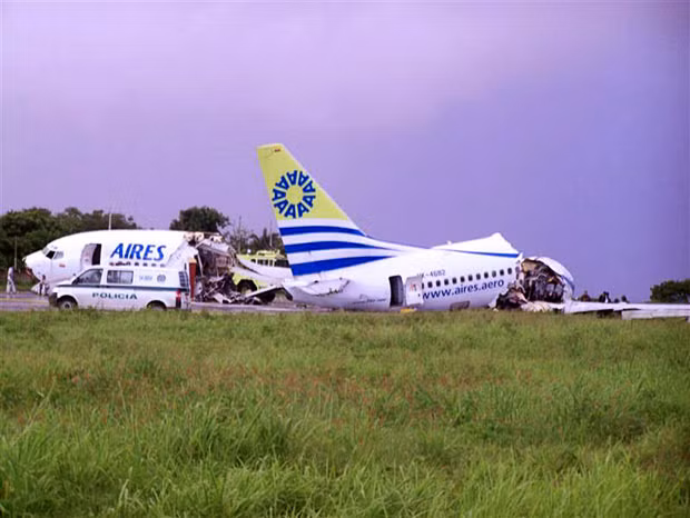 The wreckage of the Aires airlines aircraft that crashed upon landing on the airport of the Colombian island of San Andres. One person died of a suspected heart attack and 120 injured when the plane crash-landed after being struck by lightning