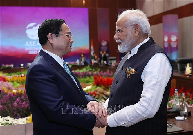 Thủ tướng Phạm Minh Chính trao đổi với Thủ tướng Ấn Độ Narendra Modi tại Hội nghị Cấp cao ASEAN - Ấn Độ lần thứ 20. Ảnh: Dương Giang/TTXVN Thủ tướng Phạm Minh Chính trao đổi với Thủ tướng Ấn Độ Narendra Modi tại Hội nghị Cấp cao ASEAN - Ấn Độ lần thứ 20. Ảnh: Dương Giang/TTXVN