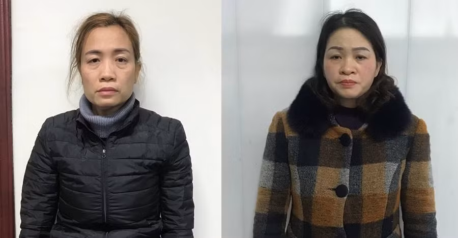 Đinh Thị Thoả (trái) và Hoàng Thị Lan tại cơ quan điều tra.