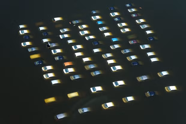 Cars are submerged in floodwaters at a Honda car factory in Ayutthaya, north of Bangkok, Thailand