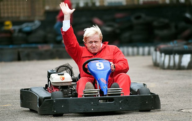 Những hình ảnh ấn tượng trong tuần ảnh 4 Boris Johnson takes a spin round the track at the Oasis Children’s Venture in Stockwell, London. The project provides 14-25 year olds with opportunities to learn vital life skills through safe, positive educational activities, keeping them off the streets and away from the lure of crime and gangs.
