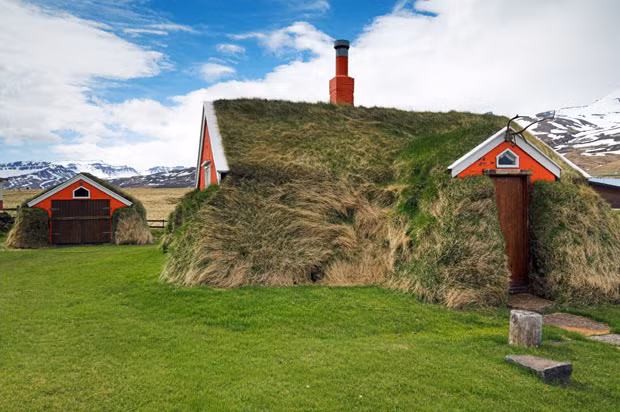 Turf house in Bakkagerdi, north east Iceland, This is a traditonal style of house building in Iceland, offering superb insulation from the harsh environment.