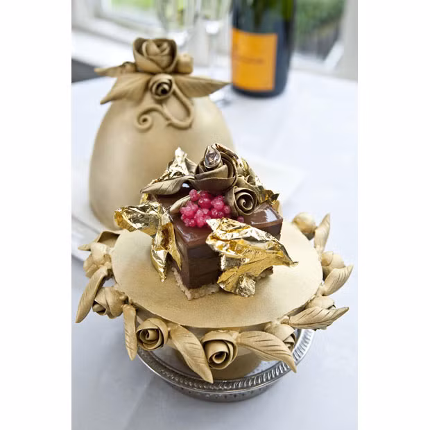 This is reportedly world’s most expensive dessert, with the eye watering price tag of £22,000. Styled like a Faberge Easter egg, the extravagant chocolate pud is believed to have broken all previous records thanks to its pricey list of ingredients which includes gold, champagne caviar and a two carat diamond. Layered with champagne jelly and a light biscuit joconde, the creation is finished with bitter dark chocolate and glazed with edible gold leaf. It has been created by Marc Guibert, head chef at Lindeth Howe Country House Hotel in Windermere, Cumbria.