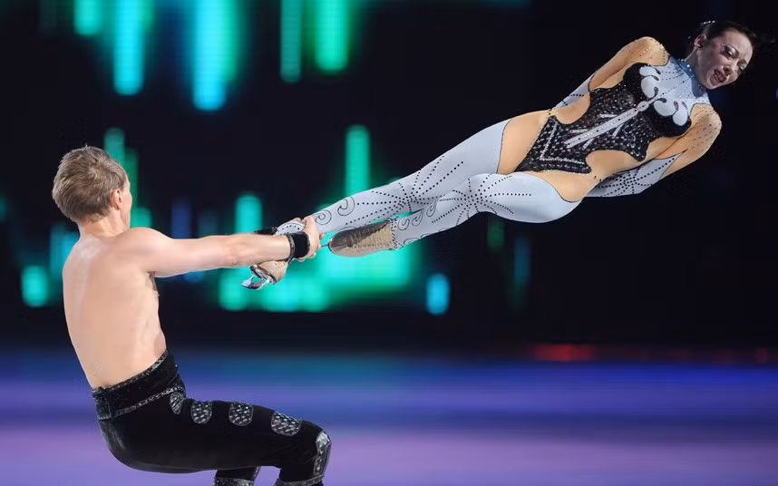 Russian figure skating pair Fiona Zaldua (R) and Dmitry Sukhanov perform at the Artistry on Ice show in Shanghai