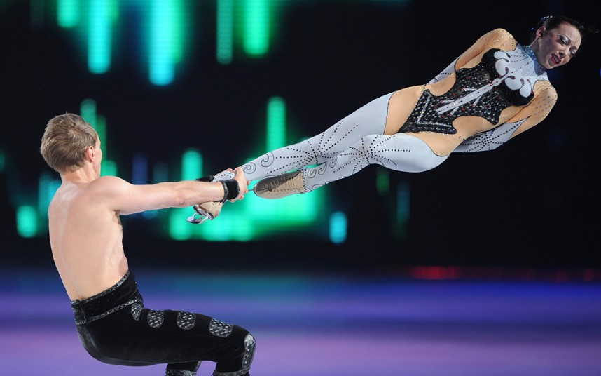 Russian figure skating pair Fiona Zaldua (R) and Dmitry Sukhanov perform at the Artistry on Ice show in Shanghai