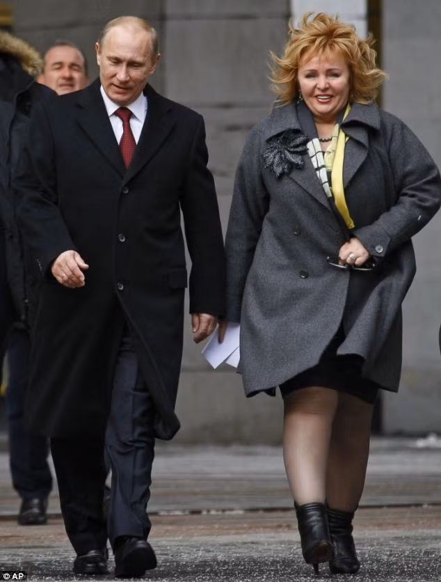 Russian President Vladimir Putin, left, and his wife Lyudmila, seen in March last year Read more: http://www.dailymail.co.uk/news/article-2337048/Russian-president-Putin-wife-Lyudmila-announce-TV-marriage-over.html#ixzz2VUJAwy73 Follow us: @MailOnline on Twitter | DailyMail on Facebook