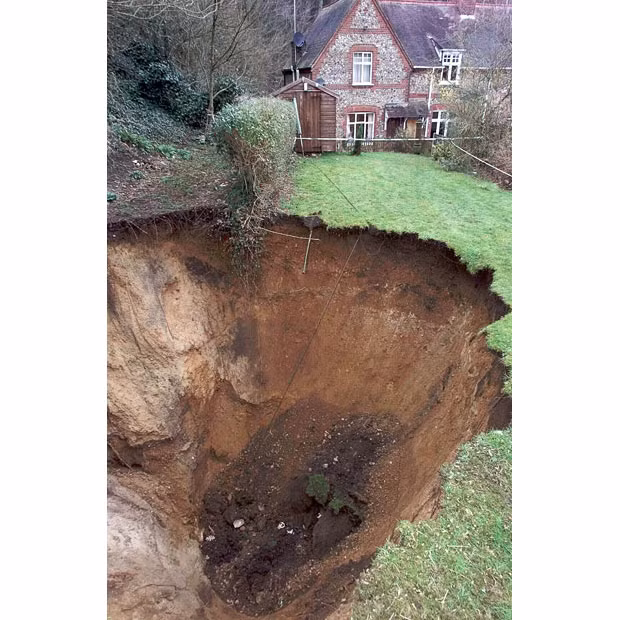 This 40-foot-deep crater appeared in Michael Whittaker’s garden in Norwich in 2001
