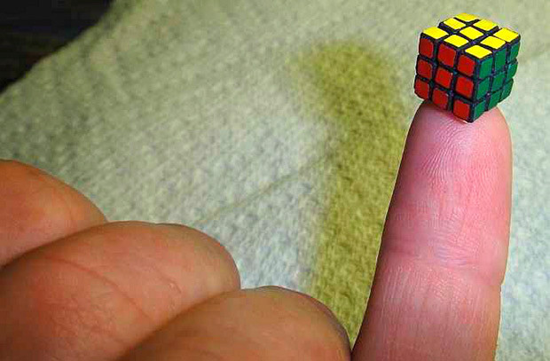 A puzzle fan has made the world’s smallest version of the Rubik’s cube measuring just 10mm wide. Evgeny Grigorev spent one month designing the pieces before having them laser cut on special plastic