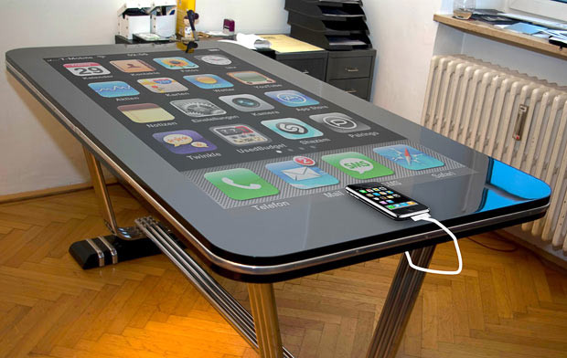 A working prototype of Table Connect - the world’s first iPhone table. Simply plug in your handset and you can control your phone just as on the real version. The 58