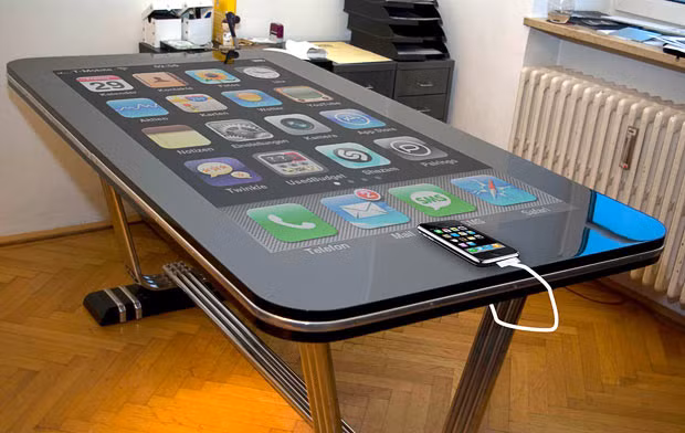 Những hình ảnh ấn tượng trong tuần ảnh 13 A working prototype of Table Connect - the world’s first iPhone table. Simply plug in your handset and you can control your phone just as on the real version. The 58