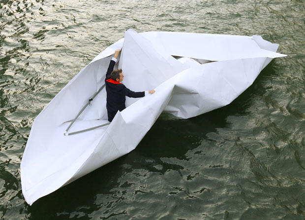 German artist Frank Bolter floats a paper boat called To The World’s End. The origami paper boat which was folded at Canary Wharf was then sailed on the nearby Thames as part of the Drift10 biennial art exhibition