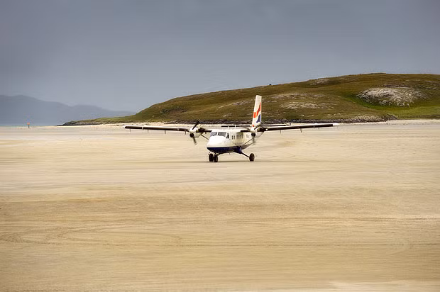 Barra Scotland Can’t wait to get off the plane and on to the beach? Head for the Hebridean island of Barra where the Scottish sands have been used as a makeshift runway since the Thirties. The airport handles 1,000 flights each year, but only when the tide is out. 