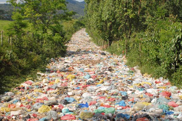A road leading to a rubbish tip in the Brazilian northeastern state of Bahia is swamped with bags of rubbish, stopping trucks travelling to the dump
