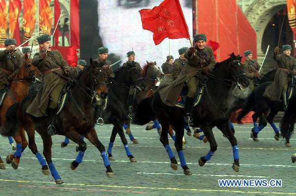 Russian soldiers in World War II uniforms attend a military parade at the Red Square in Moscow