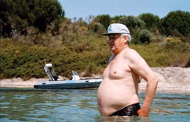 Mr Putin’s predecessor, Boris Yeltsin, was even less suited to the shirtless look, as seen here in Corfu. 
