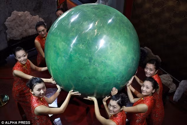 Monster: The fluorite mineral the stone is fashioned from is more valuable than diamonds in China Read more: http://www.dailymail.co.uk/news/article-1332629/The-Great-Ball-China-Six-ton-Chinese-pearl-worlds-biggest--88million-price-tags-exactly-small-either.html#ixzz164WPN69T