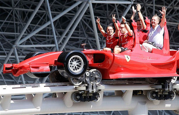 The week in pictures: 12 November 2010 Ferrari drivers Fernando Alonso and Felipe Massa wave as they ride on a rollercoaster car modelled on a Ferrari Formula One vehicle, at the Ferrari theme park in Abu Dhabi Ferrari drivers Fernando Alonso and Felipe Massa wave as they ride on a rollercoaster car modelled on a Ferrari Formula One vehicle, at the Ferrari theme park in Abu Dhabi
