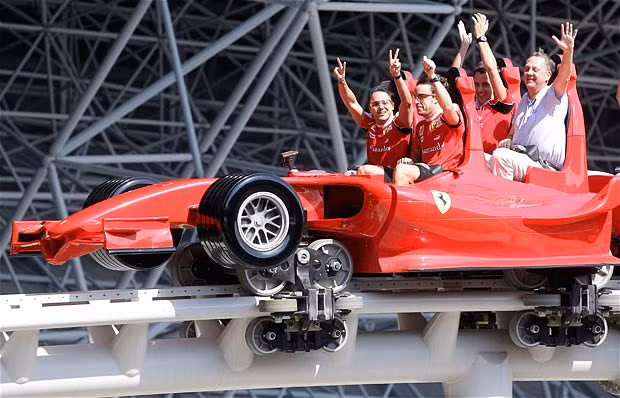 The week in pictures: 12 November 2010 Ferrari drivers Fernando Alonso and Felipe Massa wave as they ride on a rollercoaster car modelled on a Ferrari Formula One vehicle, at the Ferrari theme park in Abu Dhabi Ferrari drivers Fernando Alonso and Felipe Massa wave as they ride on a rollercoaster car modelled on a Ferrari Formula One vehicle, at the Ferrari theme park in Abu Dhabi