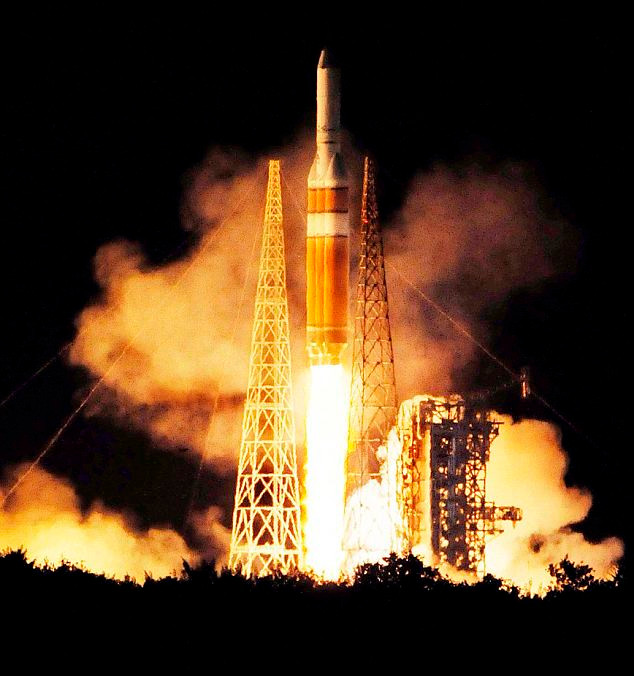 Delta 4-Heavy rocket lifts off from Cape Canaveral Air Force Station in Florida Read more: http://www.dailymail.co.uk/sciencetech/article-1331921/Top-secret-spy-satellite-blasted-space-Delta-4-Heavy-rocket.html#ixzz164hcBJoX