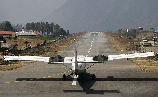 Tenzing-Hillary Nepal Another hellish destination for those of a nervous disposition, Tenzing-Hillary Airport – in eastern Nepal – features an enormous mountain at one end, and a sheer drop at the other. The runway is just 1,729-ft long, and at 2,860 metres above sea level, there are few airports found at a higher altitude. 