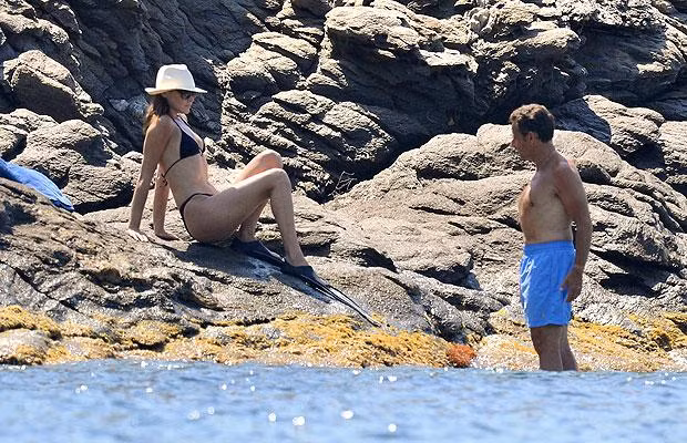 Nicholas Sarkozy and his wife Carla enjoy a dip at Le Cap Nègre on the Côte d’Azur. Is Mr Sarkozy breathing in? 