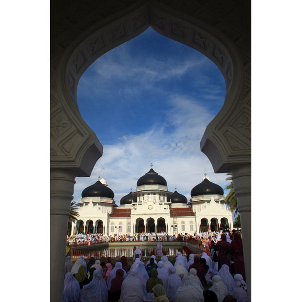 Muslims perform Eid al-Adha prayers at Baiturrahman Grand Mosque, Banda Aceh, Indonesia