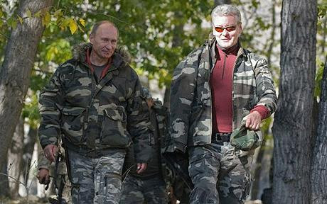 Russian Prime Minister Vladimir Putin (L) and and former Government Chief of Staff and newly-appointed Moscow Mayor Sergei Sobyanin 