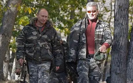 Russian Prime Minister Vladimir Putin (L) and and former Government Chief of Staff and newly-appointed Moscow Mayor Sergei Sobyanin 