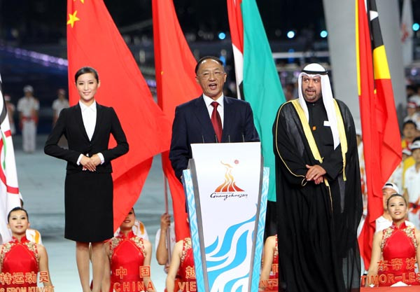 Liu Peng (C), President of Chinese Olympic Council addresses during the opening ceremony of the 16th Asian Games at the Haixinsha Island in Guangzhou, China, Nov. 12, 2010