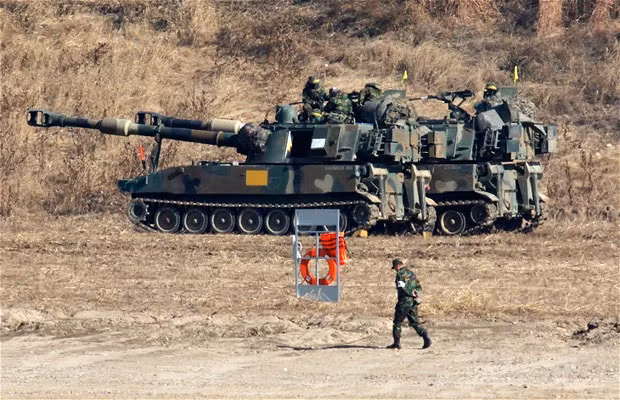 F-16 fighter jets were scrambled and South Korean land-based forces returned fire on the North as civilians were evacuated to emergency bunkers 