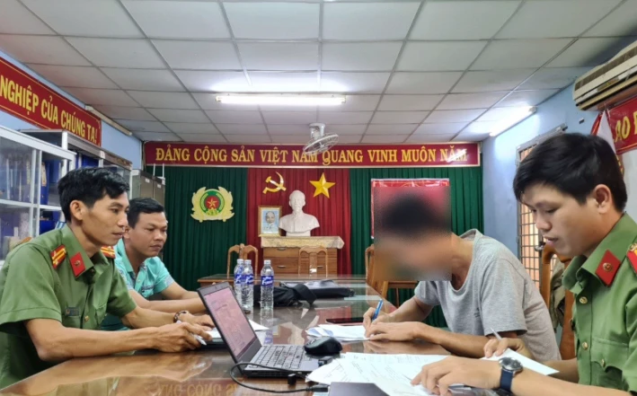 Anh B.M.T. làm việc với cơ quan công an.