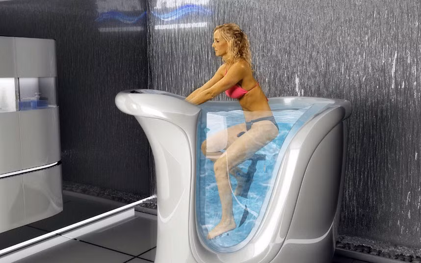 In some gyms you can relax in a hot tub after you exercise but with the new FitWet Jet Bike you can combine the two. This contraption from a Florida-based company allows users to ride an exercise bike while taking a bath. The makers of the FitWet claim 30 minutes of the jet bike is the equivalent of two hours on a normal push bike. The company also claims the machine’s 12 integral water jets ’exert a massaging action and a draining one which allows strong reduction of cellulite’.