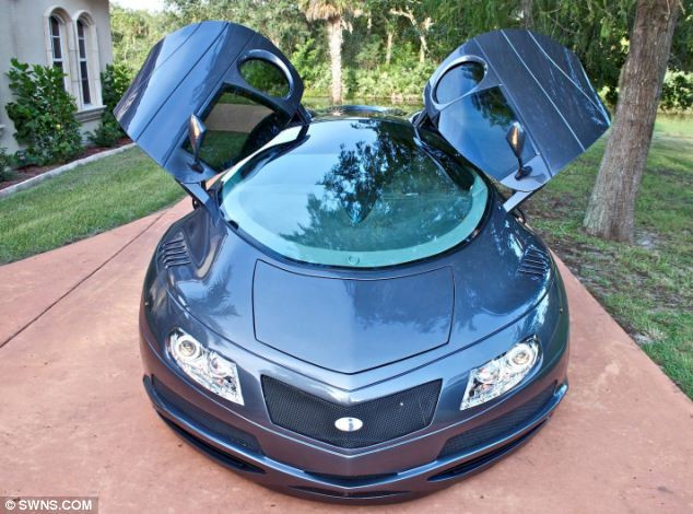 Set to impress: The car has a windscreen five feet high and gullwing windows which open automatically by remote control Read more: http://www.dailymail.co.uk/news/article-2229886/Designers-concept-car-based-science-fiction-movies-Chevrolet.html#ixzz2Bh1U7rFO Follow us: @MailOnline on Twitter | DailyMail on Facebook