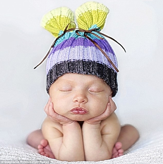 If the cap fits... I’ll be sure of a good night’s rest Read more: http://www.dailymail.co.uk/news/article-1251841/The-incredible-pictures-snoozing-newborns-taken-babies-10-days-old.html#ixzz0frLSekrv