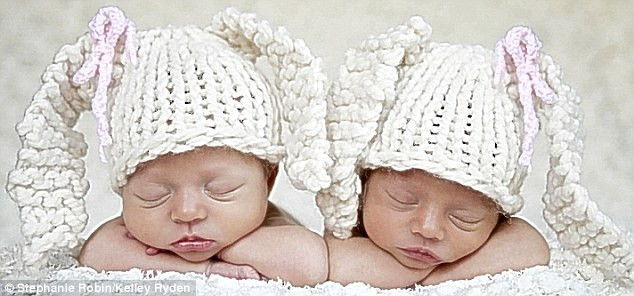 Prize guys: They came first in the bonnet baby contest Read more: http://www.dailymail.co.uk/news/article-1251841/The-incredible-pictures-snoozing-newborns-taken-babies-10-days-old.html#ixzz0frLKryaz