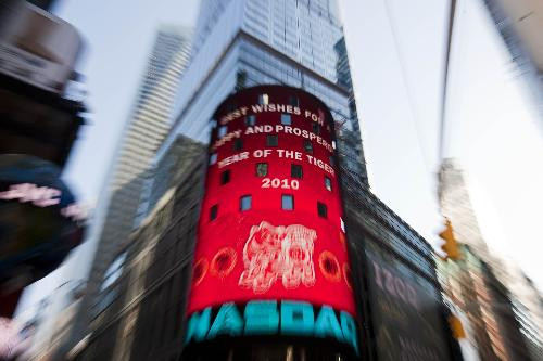New Year greetings and a tiger image are shown on the NASDAQ screen at Times Square in New York Feb. 12, 2010, in celebration of the upcoming Chinese Lunar New Year which falls on Feb. 14.